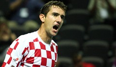 Pokazati zube tradiciji