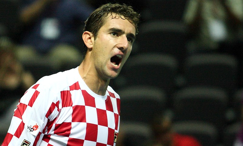 Pokazati zube tradiciji