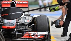 Button dobitnik, Hamilton gubitnik u Mađarskoj