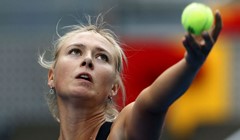 Azarenka predala bez borbe, Šarapova i sestre Williams u četvrtfinalu