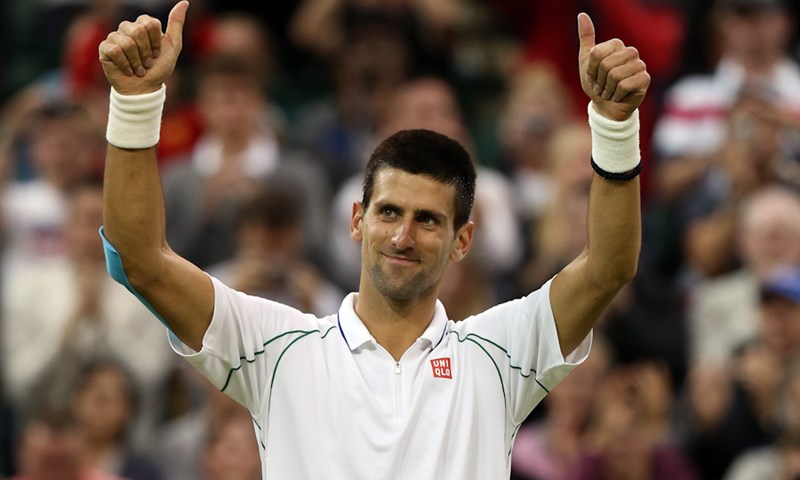 Federerovo 33. uzastopno Grand Slam četvrtfinale, Đoković lako s Troickim