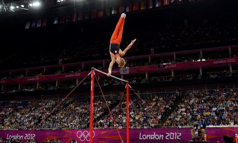 Dva zlata Kinezima, dvije medalje za Raisman
