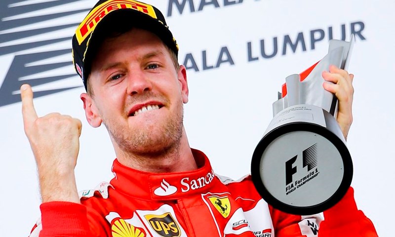 Vettel o Hamiltonu: "Rijetko radi greške, uživam se s njim utrkivati"