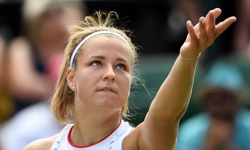 Zhang zaustavila nervoznu Wozniacki, Halep pregazila Azarenku